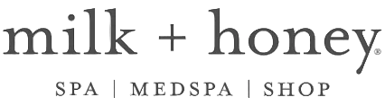 Logo of milk + honey with text 'Spa', 'Medspa', and 'Shop'.